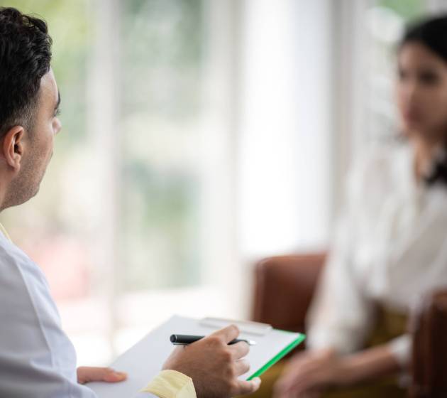 Mental health concept, Close-up of psychologist comforting his depressed patient, Doctor (psychiatrist) consultation and diagnostic examining woman patient